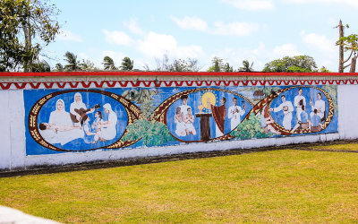 Wall mural surrounding a religious monument on Tutuila Island in American Samoa