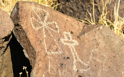 Crosses carved by Spanish settlers in Rinconada Canyon in Petroglyph National Monument