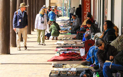 The Palace of the Governors host vendors in Santa Fe Plaza