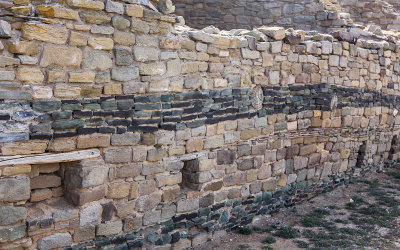 Unique bands of green sandstone along an outside West Ruin wall in Aztec Ruins National Monument