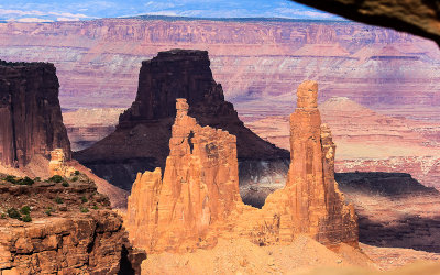 Washer Woman Arch and Airport Tower viewed through Mesa Arch in Canyonlands National Park