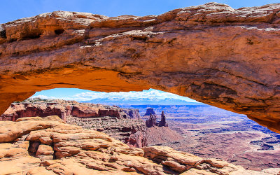 La Sal Mountains viewed through Mesa Arch in Canyonlands National Park