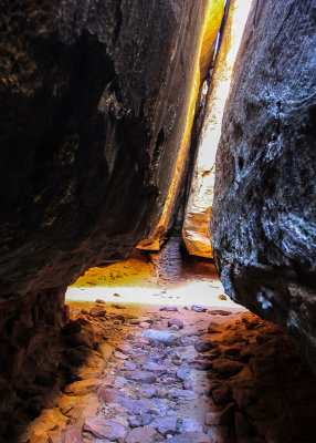 Winding through deep narrow fractures along the Joint Trail in Canyonlands National Park