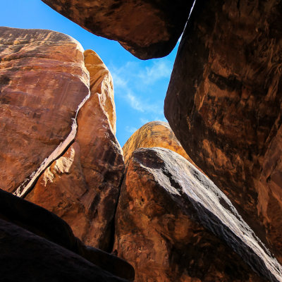 Looking up through the sandstone spires on the Joint Trail in Canyonlands National Park