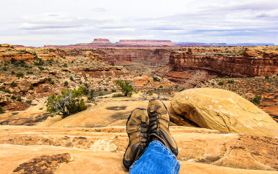 Lunch break at the edge of Big Spring Canyon along the Slickrock Trail in Canyonlands National Park