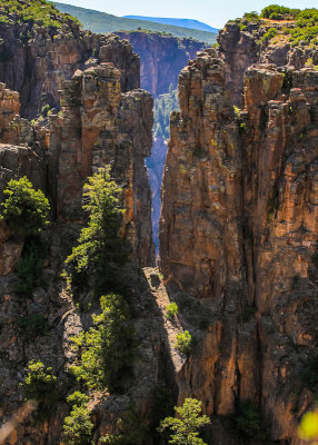 Hole in the canyon wall as seen from Devils Lookout in Black Canyon of the Gunnison National Park