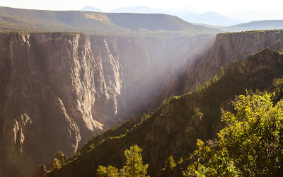 Morning sun floods the canyon as seen from the Warner Point Trail in Black Canyon of the Gunnison National Park