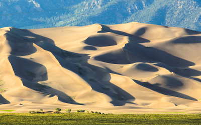 Evening shadows fall across the dunes in Great Sand Dunes National Park