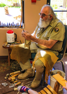 Park volunteer makes flint tools at the visitor center in Alibates Flint Quarries National Monument
