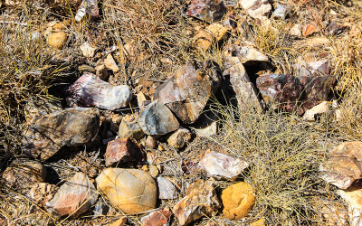 Quarry waste pile with broken and discarded tools and flakes in Alibates Flint Quarries National Monument