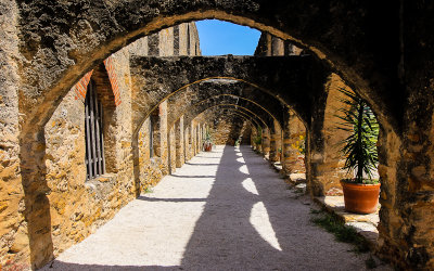 Arched walkway in the courtyard at Mission San Jose in San Antonio Missions NHP