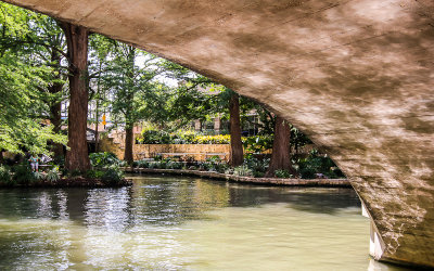 Sunlight reflected off of the water along the San Antonio River Walk