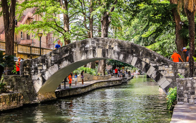 Stone bridge over the San Antonio River Walk