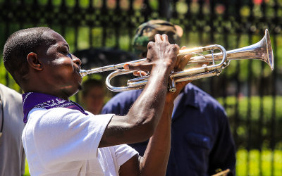 Trumpet player in front of St. Louis Cathedral in the French Quarter