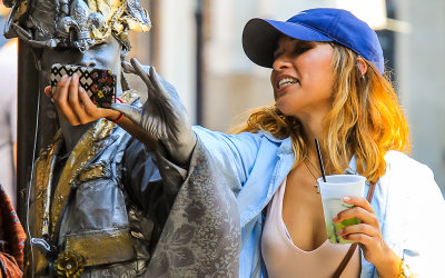 Getting a selfie with a street performer in the French Quarter