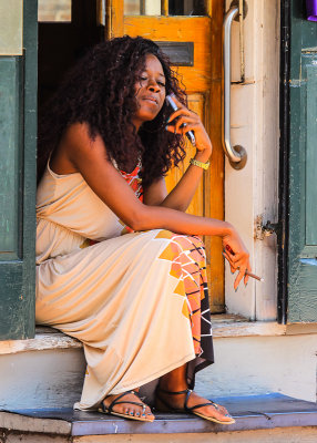 Bourbon St. fan takes a break in the French Quarter