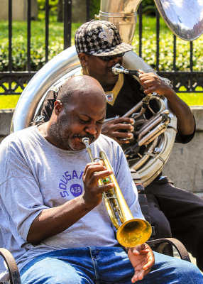 Musicians play in front of St. Louis Cathedral in the French Quarter 