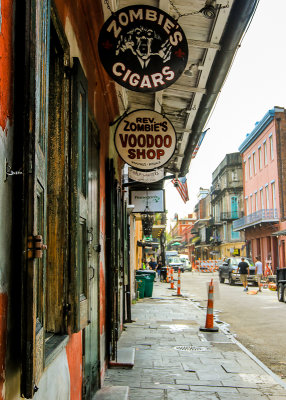 Overhead signs in the French Quarter