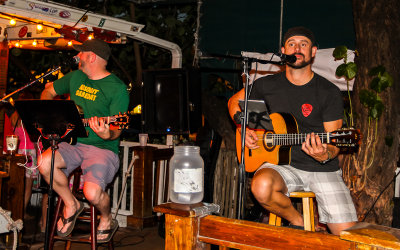 Musicians at an open street side bar at Fantasy Fest