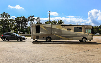 RV pulling my Subaru parked at the Blue Elbow Swamp