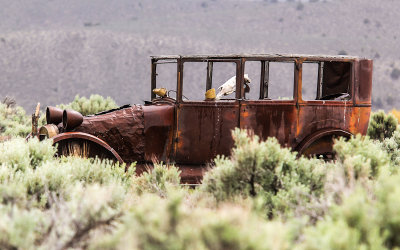 Old car rusting on the prairie outside of Great Basin National Park