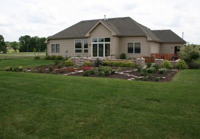 June 2011 - Pathway set, roses etc going in