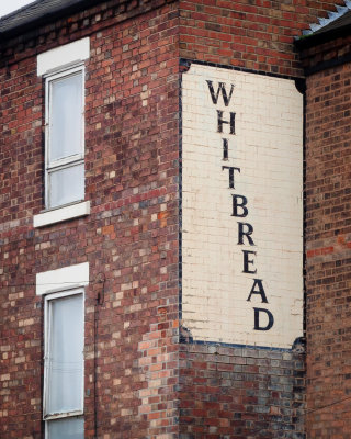 Whitbread 'ghost' sign, Queens Road, Beeston.jpg