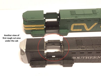 abc first cut out of solid cab area Atlas-Kato shell.jpg