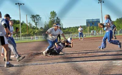 Katie Applies Tag in LF C 3B Double Play