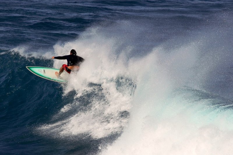 Surfer at Hookipa Beach IV