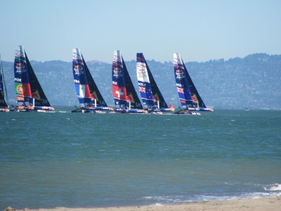They race on identical AC45 boats.