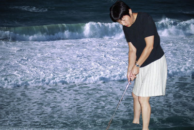 Katsuko golfing in water