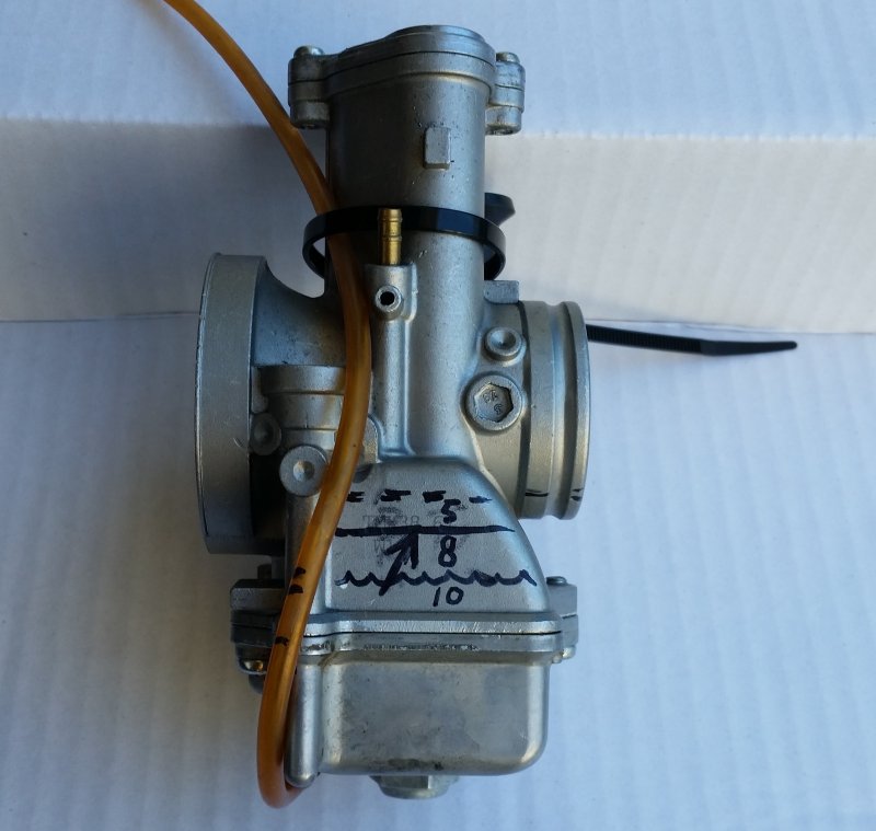 Mikuni TMX Marked for Discussion- Arrow Marks the Overflow Tube Inside