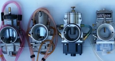 Carburetor Intakes of Keihin, SmartCarb, and Lectron- Notice there are no outside-air vent tubes on the SmartCarb