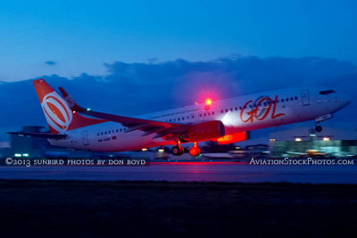 2013 - GOL Transportes Aereos B737-8EH PR-GUH takeoff at dusk aviation airline stock photo