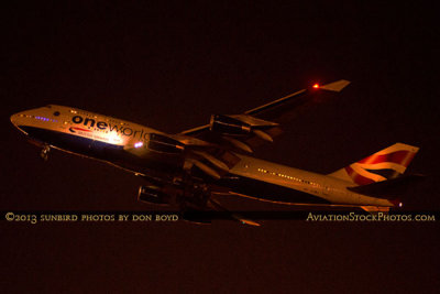 2013 - British Airways One World B747-436 G-BNLI night takeoff aviation airline stock photo