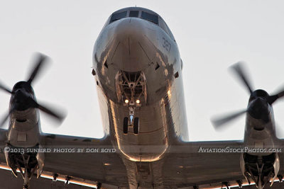 2013 - U. S. Navy P-3 Orion on short final approach to OPF military aviation stock photo