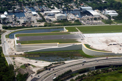 2014 - closer up aerial photo of the elevated portion of FLL's new runway 10R-28L aviation stock photo #5557C