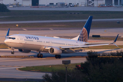 2015 - United Airlines B737-924ER N66828 rare takeoff on runway 28 at TPA aviation airline stock photo #9376