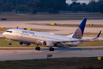 2015 - United Airlines B737-924ER N66828 rare takeoff on runway 28 at TPA aviation airline stock photo #9377