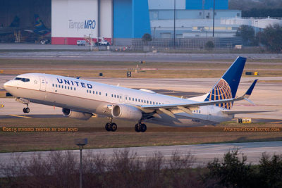 2015 - United Airlines B737-924ER N66828 rare takeoff on runway 28 at TPA aviation airline stock photo #9378