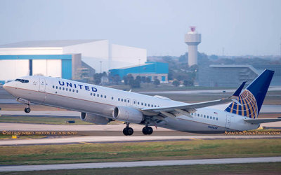 2015 - United Airlines B737-924ER N66828 rare takeoff on runway 28 at TPA aviation airline stock photo #9379