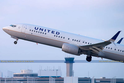 2015 - United Airlines B737-924ER N66828 rare takeoff on runway 28 at TPA aviation airline stock photo #9380