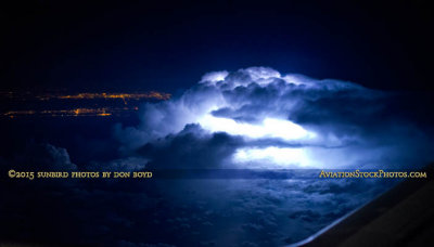 2015 - a huge and high cloud full of lightning offshore of Cape Canaveral, Florida stock photo #1586