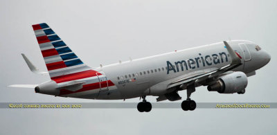 American Airlines Airbus A319-112 N5007E on takeoff roll on runway 27 aviation airline stock photo