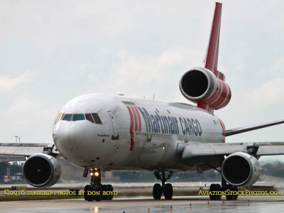 Martinair Cargo MD-11F PH-MCU taxiing out for takeoff on runway 27 aviation cargo airline stock photo