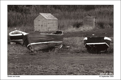 Beached boats and old sheds