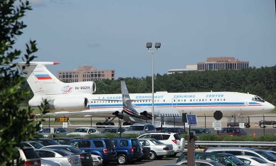 Tu-154 parked among the much smaller business jets in IAD