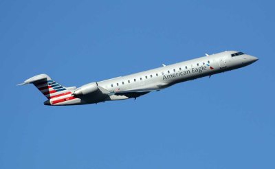 CRJ-700 in AA's new livery taking off from LGA.