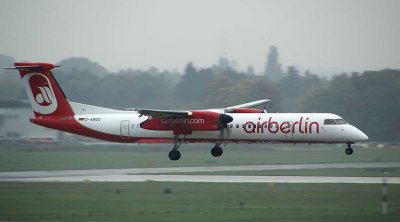 Air Berlin Dash-8-400 moments away from touching down in DUS, Oct 2013